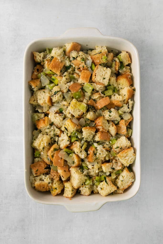 Bread stuffing in a white dish.