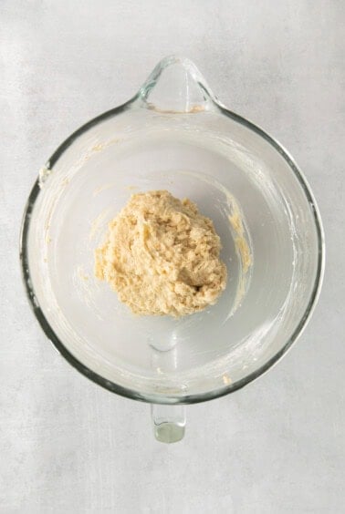 a glass bowl with a mixture in it.