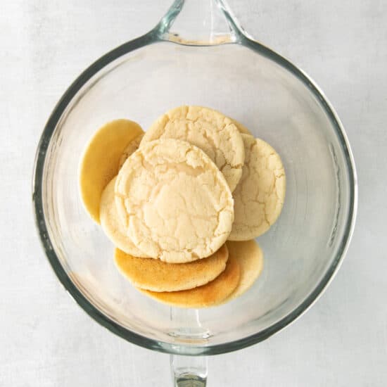 cookies in a glass bowl on a white background.