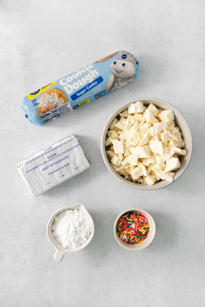 the ingredients for a snickerdoodle cake are laid out on a table.