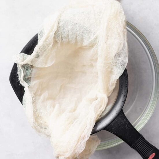 A pan with a ricotta-filled cloth.
