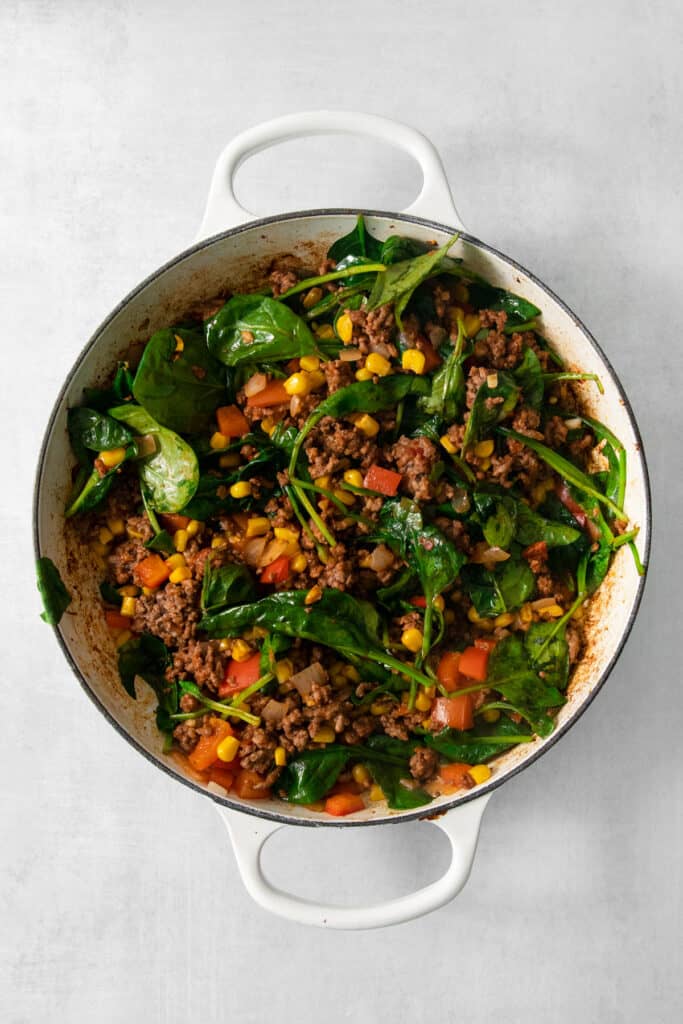 A cowboy casserole filled with vegetables and meat.