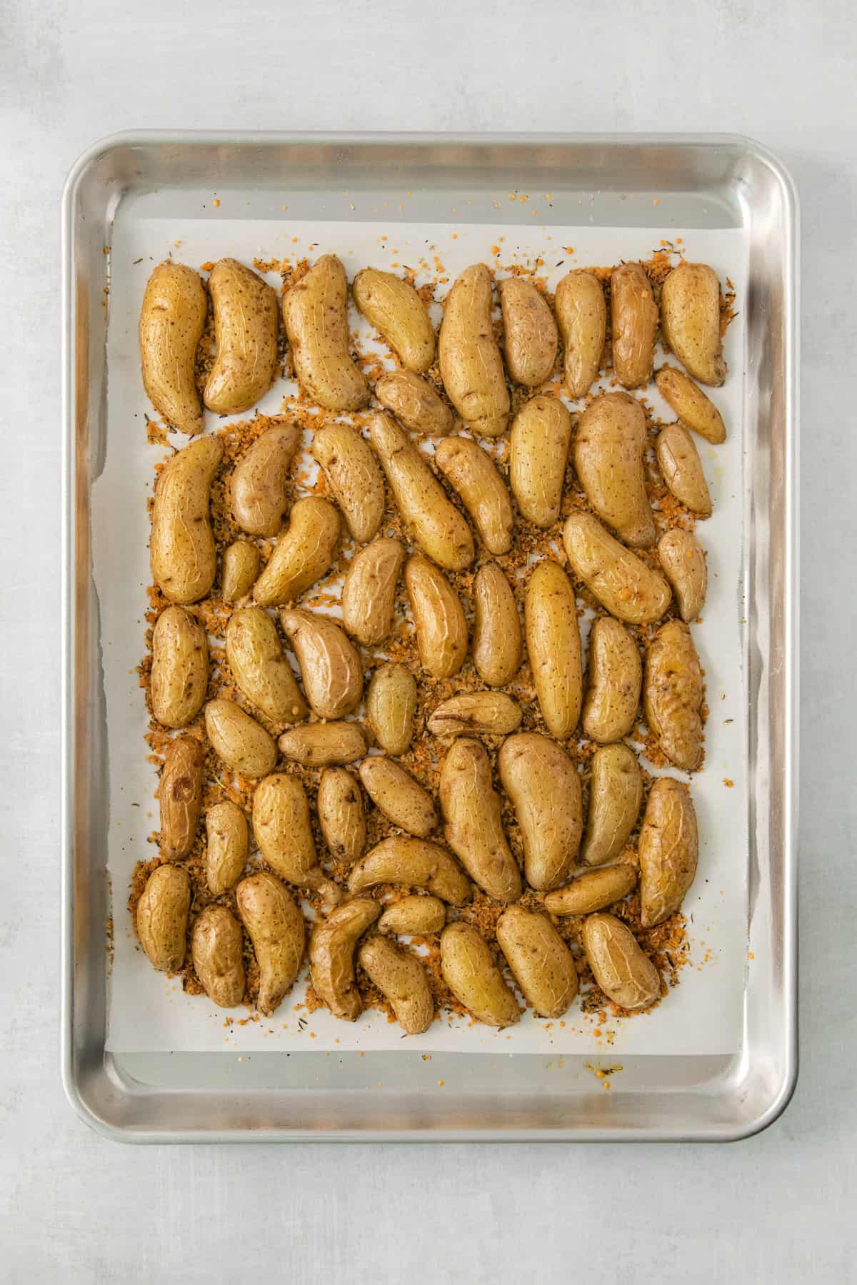 Roasted potatoes on a baking sheet.