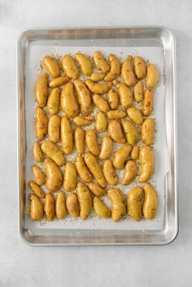 Roasted potatoes on a baking sheet.