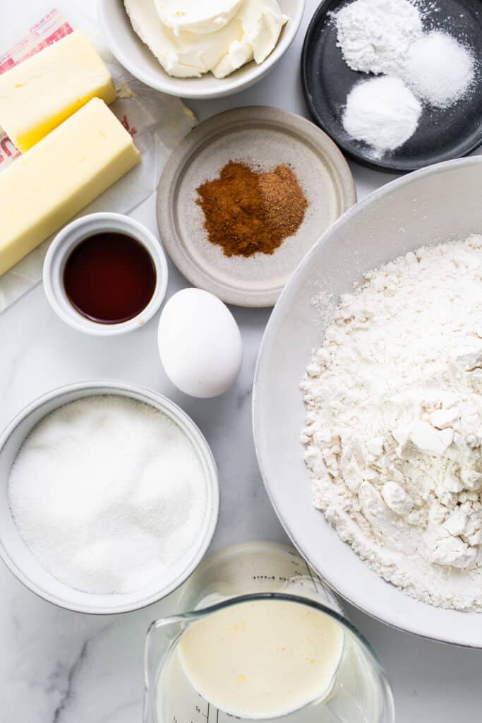 A bowl of flour, sugar, butter and other ingredients.