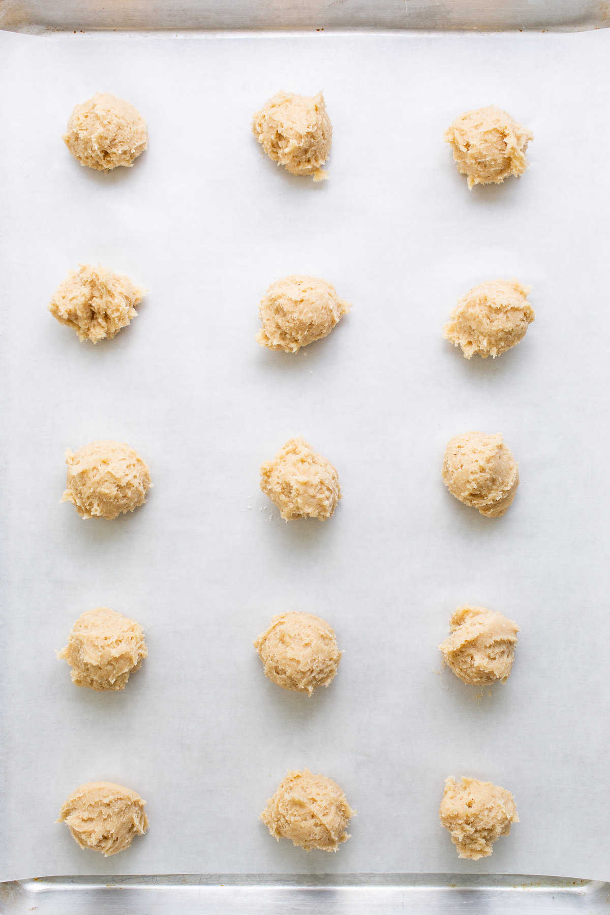 Peanut butter cookies on a baking sheet.