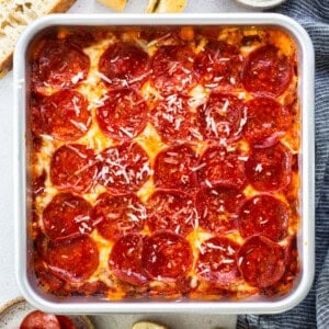 Pepperoni pizza casserole in a baking dish.