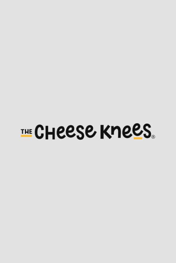 A logo with the text "The Cheese Knees" in a playful font, featuring small yellow accents on some of the letters. The text is centered on a light grey background.