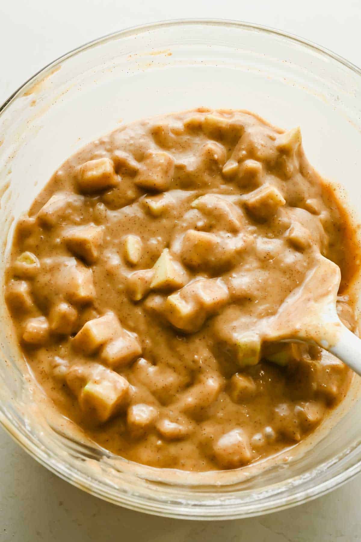 Cinnamon apple bread batter mixed with diced Granny Smith apples