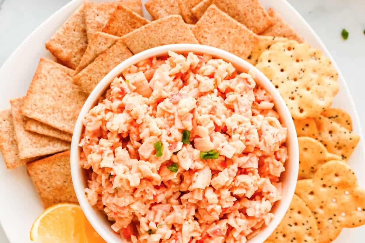 Cold crab dip served in a bowl with crackers